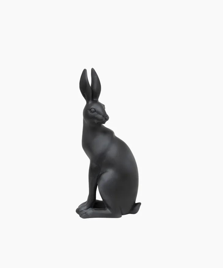 Black hare with turned head resin sculpture