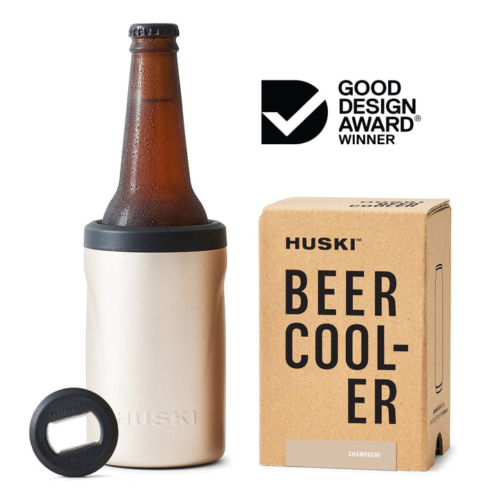 Huski beer cooler with bottle, box, and bottle opener on a white background