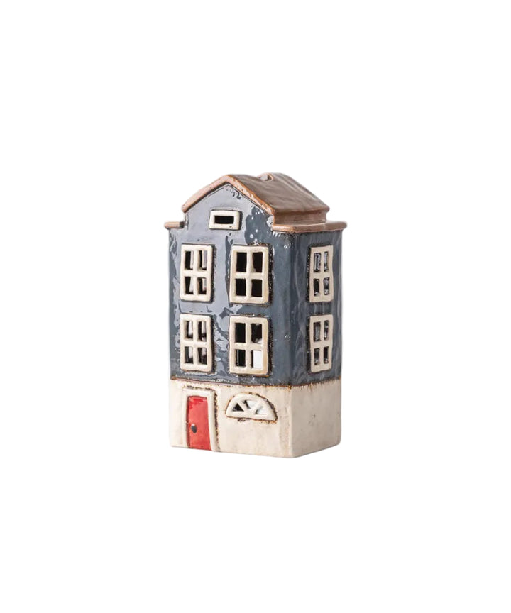 ceramic christmas tealight house, light up your christmas decorating with this unique piece