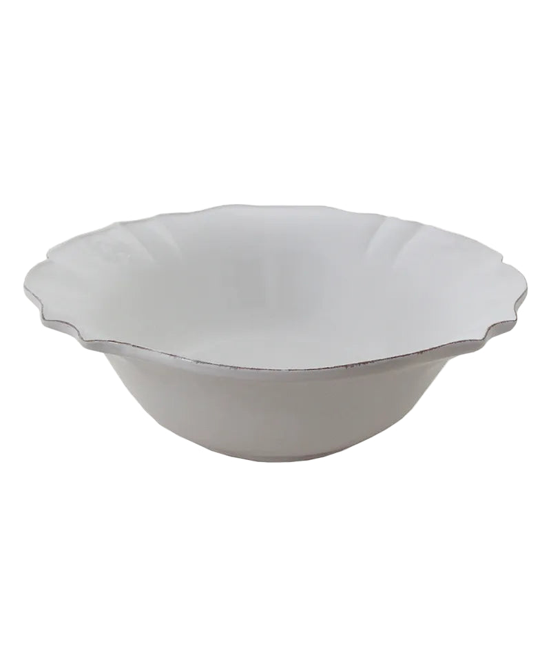 white round ceramic bowl with scalloped edges, ideal for entertaining