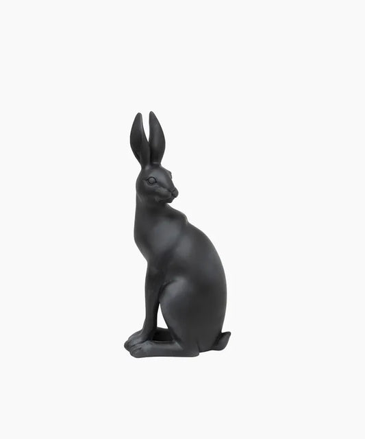 Black hare with turned head resin sculpture