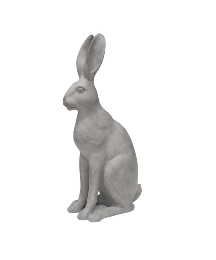 Gray rabbit statue on a white background