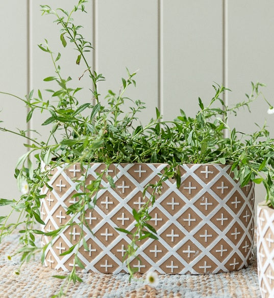 oval concrete plant pot cross design terracotta and white