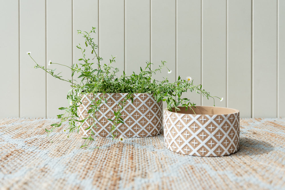 Round cross design plant pot in terracotta and white