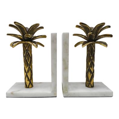Palm tree book ends in marble and brass-look