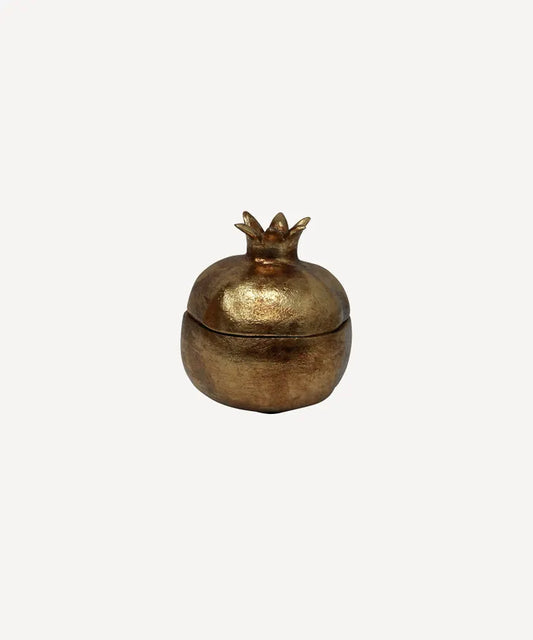 Bronze-colored decorative object with a crown on a white background