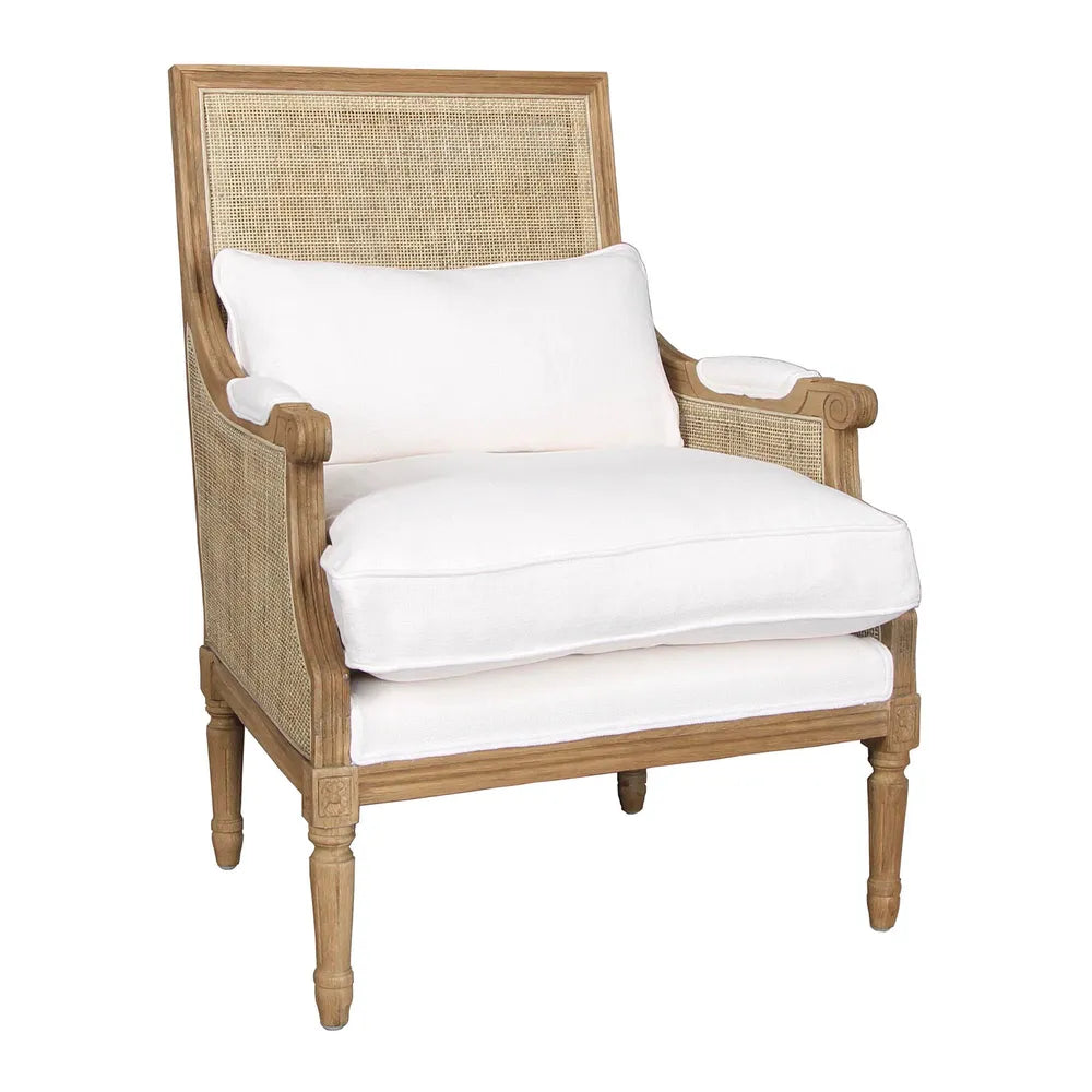 Carved oak armchair with white cotton cushion and ratan back and sides