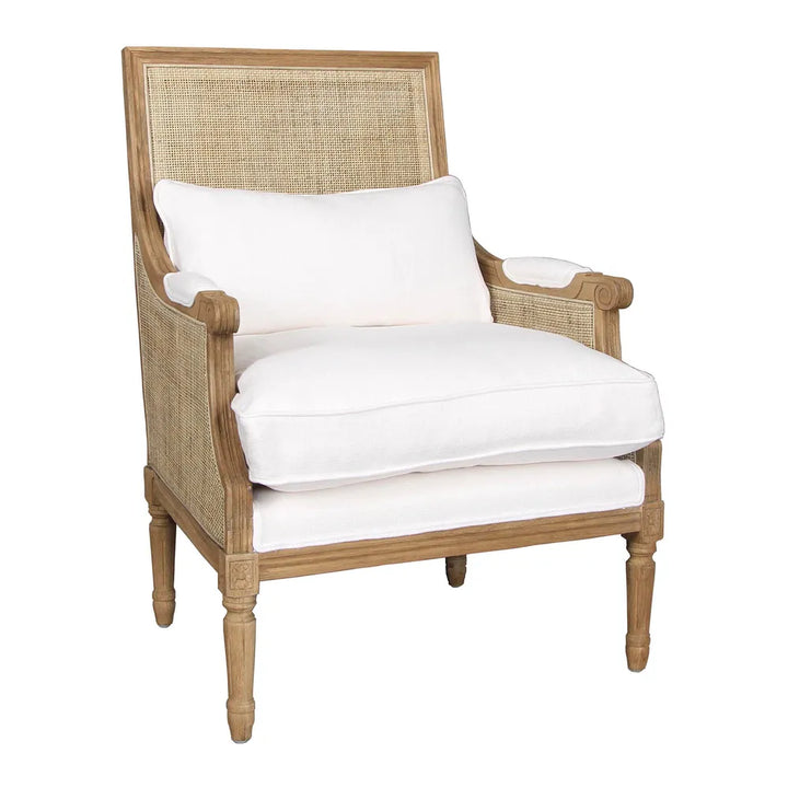 Carved oak armchair with white cotton cushion and ratan back and sides