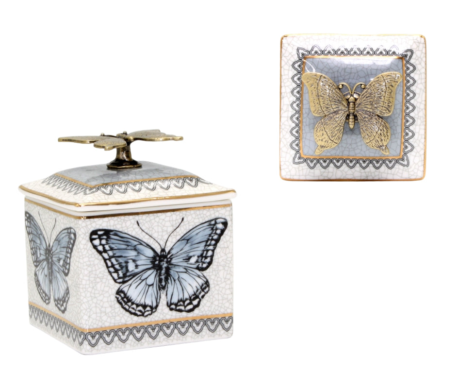 Decorative box with butterfly design and matching napkin in the corner