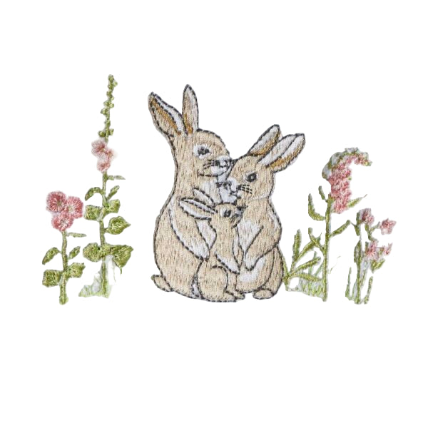Embroidered design of two rabbits embracing with flowers on a white fabric background