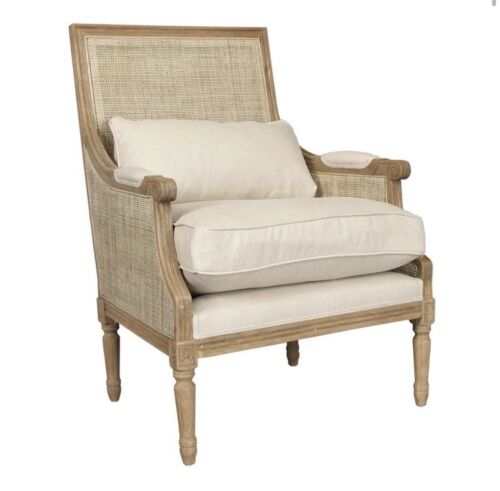 Carved oak arm chair, ratan back and sides, cotton cushion, neutral